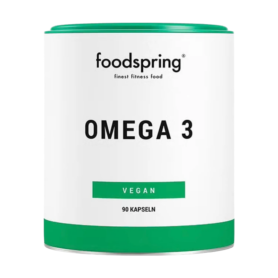 Close-up image of Foodspring Omega 3 Vegan supplement bottle with 90 capsules, a plant-based source of essential fatty acids for overall health and wellness