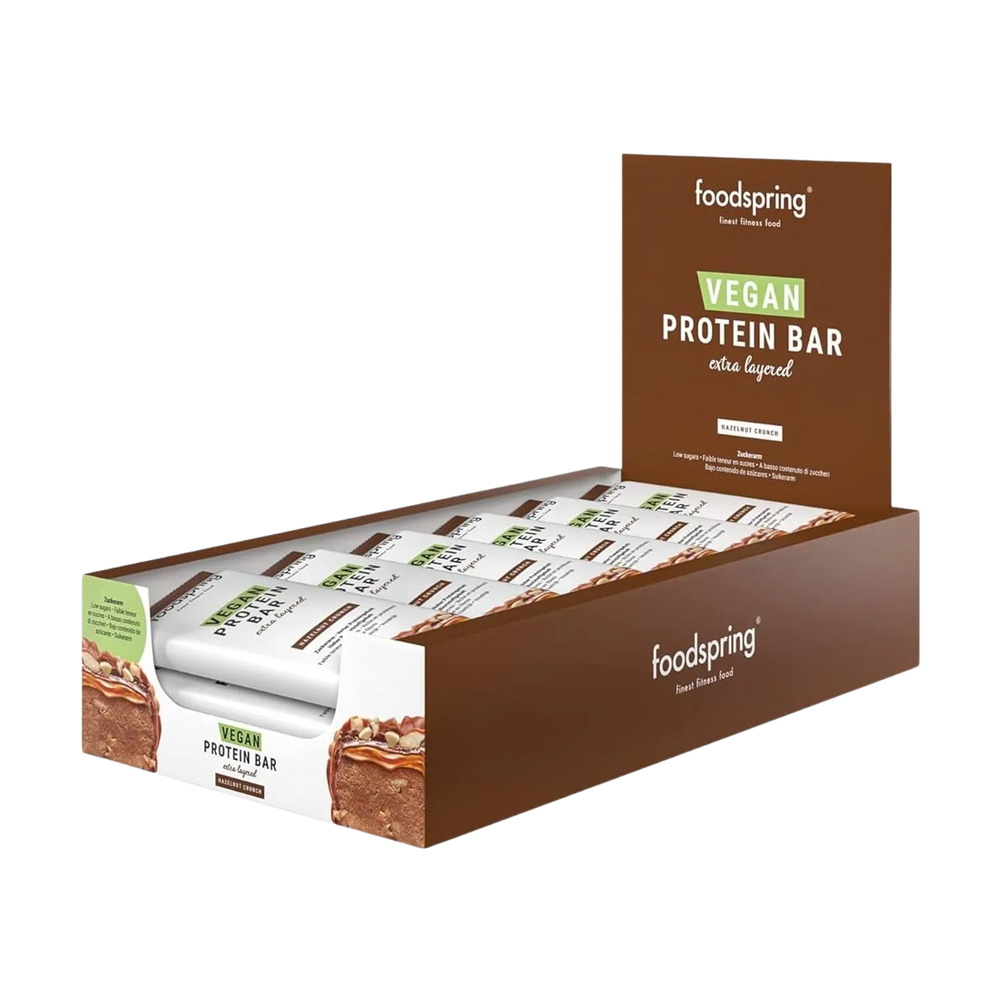 Indulge in the rich and decadent Foodspring Vegan Protein Bar Extra Chocolate, a 45g plant-based snack packed with quality protein and delicious chocolate flavor