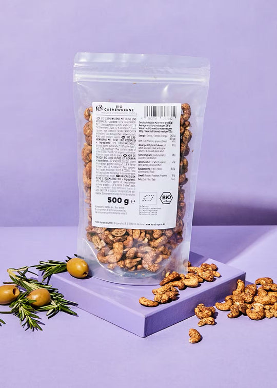 Organic 500g bag of KoRo Bio Cashewkerne mit Olive und Rosmarin, a delicious blend of cashews, olives, and rosemary, perfect for snacking or cooking