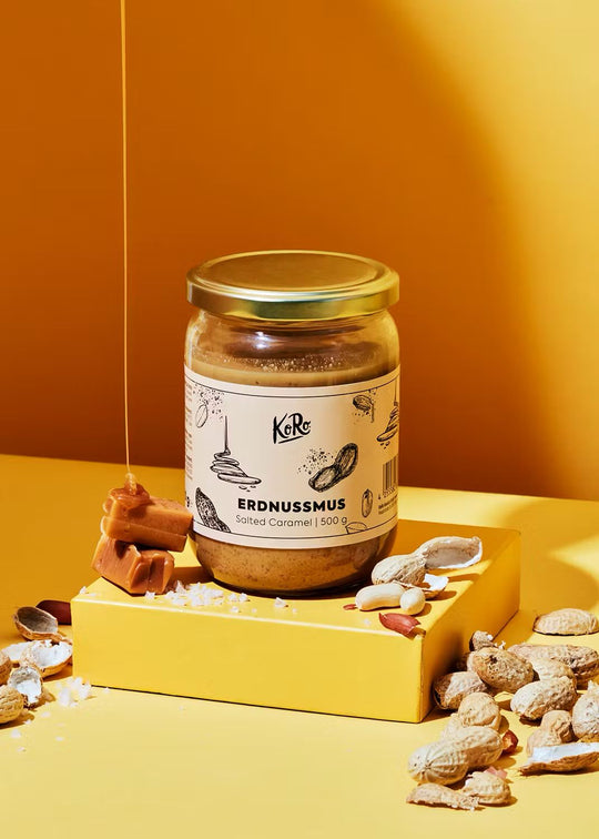 KoRo Erdnussmus Salted Caramel 500g, a delicious and creamy peanut butter spread with a hint of salted caramel flavor, perfect for sweet and savory recipes