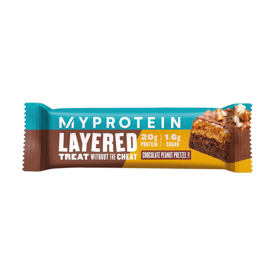 A close-up image of a 60g Myprotein Layered Bar in its packaging, showing the multiple layers of chocolate, caramel, and crispies